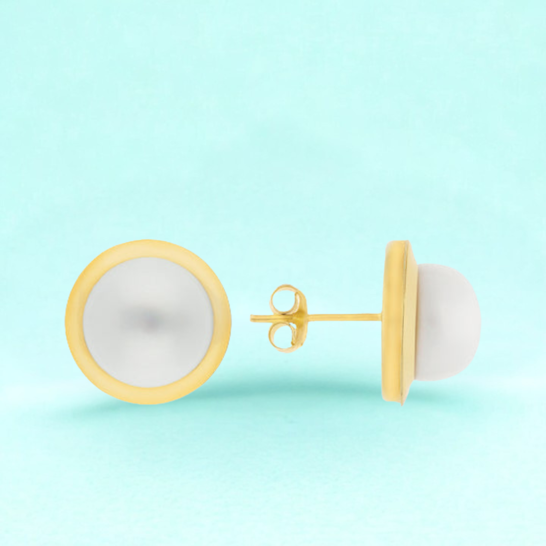 Aretes con piedras blancas en Oro amarillo de 10k